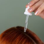 shiny greasy limp strands